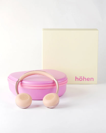 Complete set of the höhen aura mini headphones including the pink travel case and the premium branded cream and pink packaging box