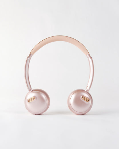 Outer view of the höhen aura mini headphones featuring a sleek metallic pink finish