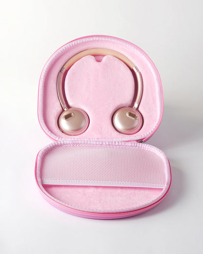 Inside view of the pink höhen aura mini wireless headphones safely stored in their matching pink protective travel case with a mesh pocket