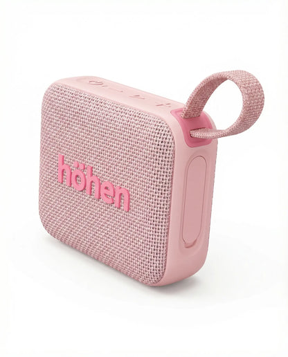 Detalle lateral del parlante inalámbrico Höhen Move negro mostrando controles de silicona y puerto de carga.