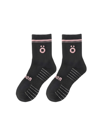 Pair of black höhen sports socks for women, technical design with support and comfortable fit for training