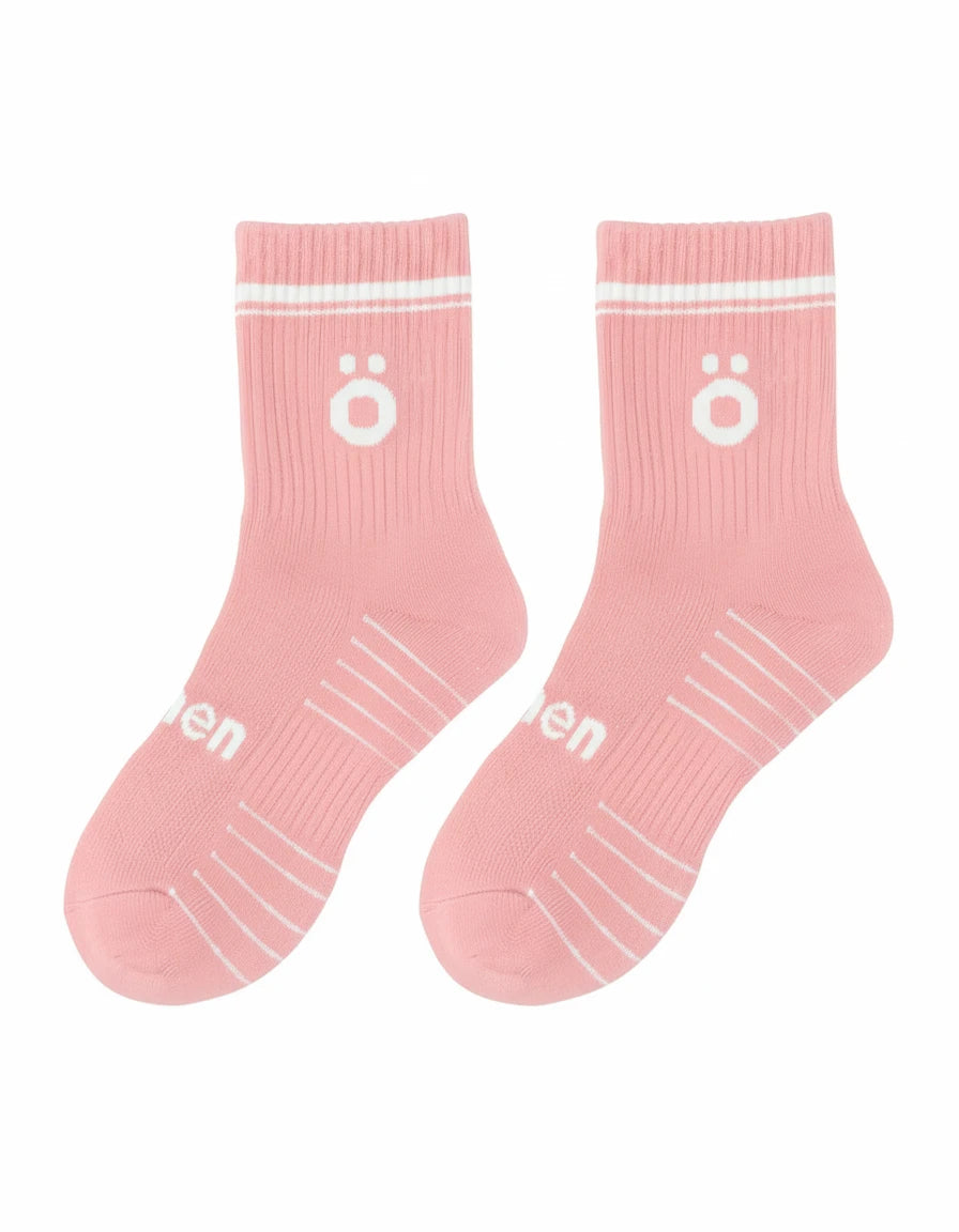 Pair of pink höhen sports socks for women, technical design with support and comfortable fit for training
