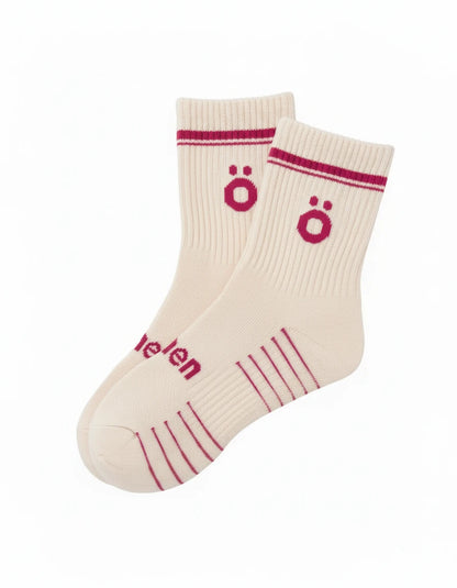 Pair of white höhen sports socks for women, technical design with support and comfortable fit for training