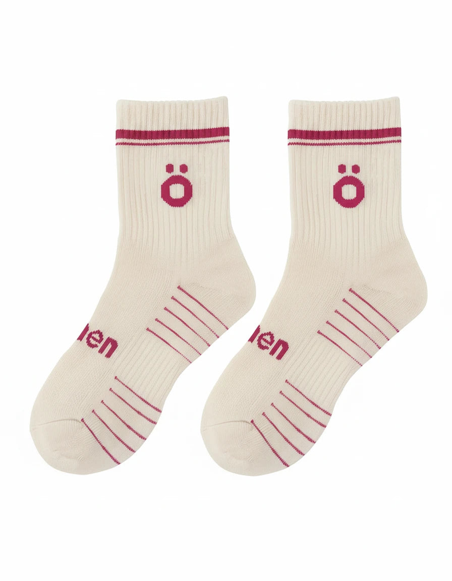 Pair of white höhen sports socks for women, technical design with support and comfortable fit for training